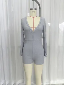 Tutina sexy grigia in maglia a coste con maniche lunghe e scollo a V