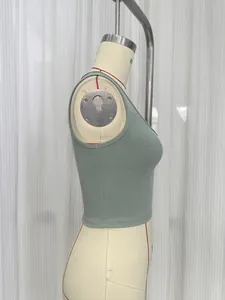 Side view detail of an avocado green ribbed V-neck cropped tank top shown on a mannequin
