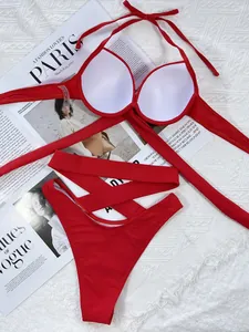 Detailed macro view of a red sexy high-waisted bandage bikini with soft padding