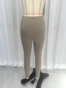 Detailweergave van de elastische skinny legging met hoge taille in kaki voor dames