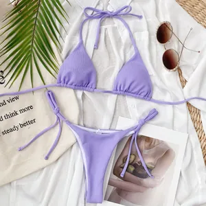 Macro detail showing the ribbed fabric texture of this lavender purple triangle bikini set.