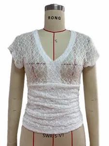 Close-up of white floral lace short sleeve top with V-neck on a professional mannequin.