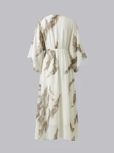 Back view of bohemian maxi dress featuring brown feather print and batwing sleeves