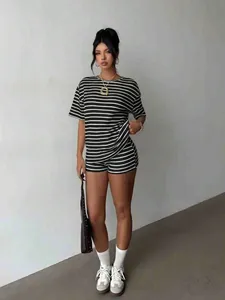 Chic black and white striped two-piece lounge set for women featuring a crew neck tee and shorts
