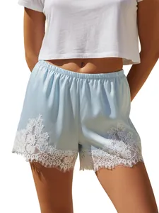 Elegant light blue satin pajama shorts featuring delicate white lace trim detail