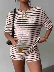 Close-up of waffle knit texture on striped summer short sleeve and shorts outfit