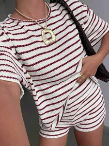 Detailed view of women's textured striped t-shirt and shorts two-piece casual set