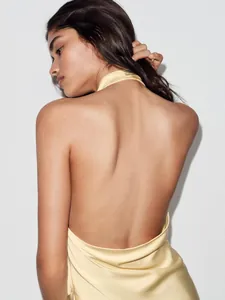 Top sexy con scollo all'americana senza schiena in elegante raso drappeggiato giallo tenue