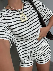Detailed shot of striped casual two-piece set with textured fabric for women