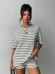 Casual black and white striped two-piece set featuring short-sleeved top and matching shorts