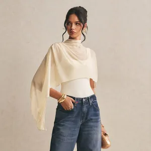 Elegant off-white asymmetric mesh shawl bodysuit with sleeveless design for women.