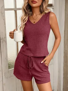 Detailed view of women's wine red ribbed loungewear set with V-neck top and shorts