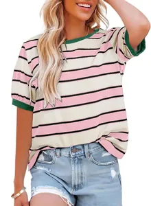 Full view of a striped casual T-shirt with pink and green contrast details on model.