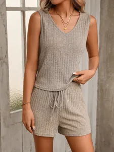 Detailed shot of the V-neck sleeveless ribbed knit top and drawstring shorts set
