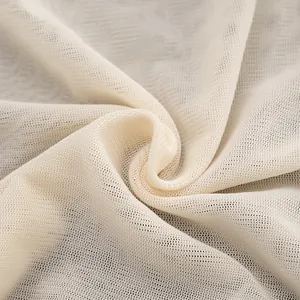 Close-up detail of the breathable off-white mesh fabric texture for women's bodysuit