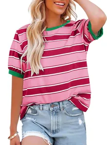 Close-up of women's striped T-shirt with vibrant green trim and pink maroon patterns