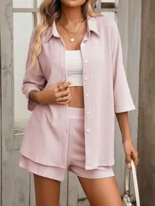Detailed view of pink textured stripe shirt and high waist shorts leisure set