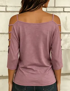 Back view of pink cold-shoulder top featuring unique ladder cut-out sleeve details