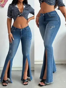 Detailed view of women's distressed flare jeans featuring stylish front leg slits.