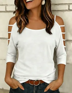 Close-up detail of a white off-shoulder women's T-shirt with stylish cutout sleeve accents