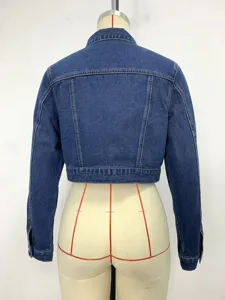 High-quality back view of a cropped blue denim jacket for women on a mannequin stand
