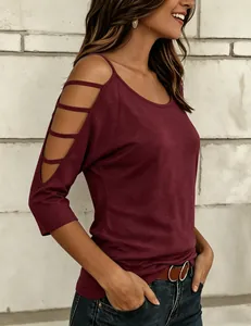 Detail of maroon cold shoulder t-shirt with cut-out sleeve design for women