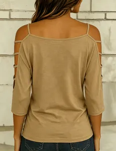 Detailed back view of a casual khaki cold-shoulder T-shirt with stylish cutout sleeve details