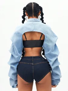 Detail view of fashionable ultra-short women's denim jacket with open back design.