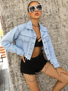 Street style light blue cropped denim jacket featuring raw hem and relaxed fit for women