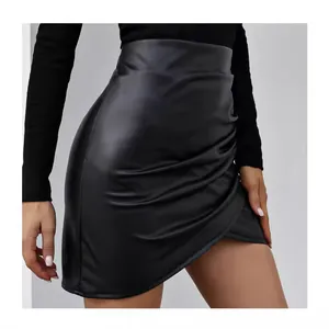 Stylish women's black PU leather mini skirt with irregular hem and ruched waist design