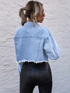 Fashionable light blue cropped denim jacket with raw hem detail shown from the back