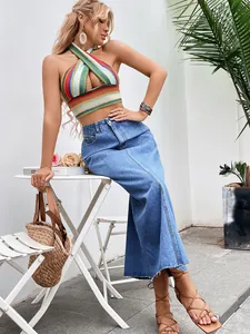 Fashionable high-waisted A-line denim maxi skirt featuring a trendy raw hem finish