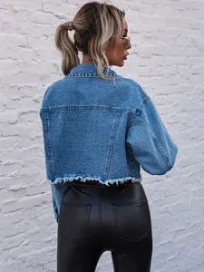 Detailed back view of a loose cropped denim jacket featuring a stylish frayed hem