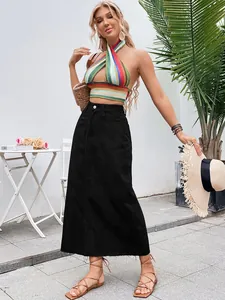 Detailed view of women's high-waist black A-line denim maxi skirt with frayed hem