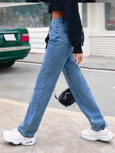 Side view of trendy high-waisted light blue straight-leg jeans styled for street wear