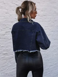 Back view of a trendy cropped oversized denim jacket with raw hem and distressed details
