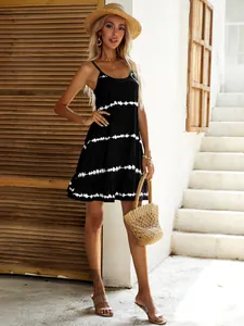 Elegant black tie-dye camisole dress with ruffled hem, perfect for summer vacation