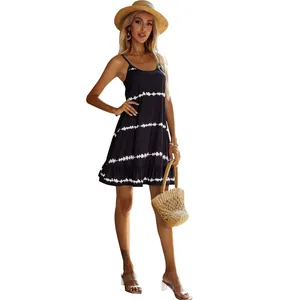 Summer casual black camisole dress featuring white tie-dye stripes and ruffle hemline
