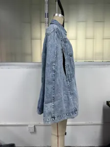 Detailed side profile of a women's fashion irregular loose fit washed blue denim jacket