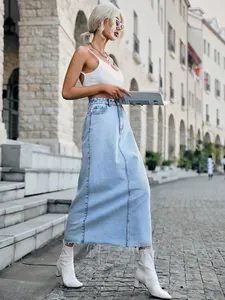 Chic high-waisted denim A-line maxi skirt with frayed raw hem detailing