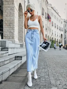 Stylish high-waisted A-line denim midi skirt with frayed hem detail in light blue wash