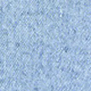 Close-up macro view showing the light blue denim fabric texture and weave detail