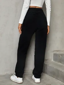 Detailed back view of fashionable high-waisted baggy black denim jeans for women
