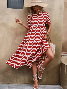 Red and white wave print midi dress with puff sleeves, tiered skirt and summer holiday style
