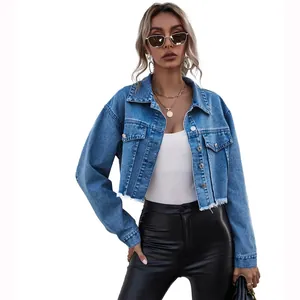 Casual women's cropped denim jacket with distressed frayed hem and loose fit styling