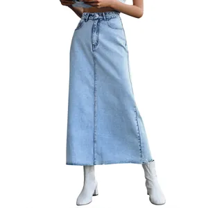 High-waist A-line denim maxi skirt in light blue with distressed raw hem details