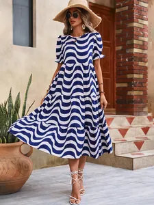Boho blue and white wave print tiered maxi dress with puff sleeves for summer vacation