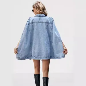 Back view of women's irregular loose light blue denim jacket with flared cape design