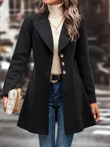 Elegant black wool coat detail featuring a classic lapel and single-breasted buttons