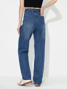 Back view of high-waisted loose blue denim jeans showing pocket details